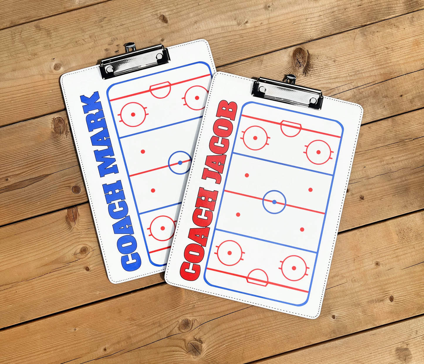 coach clipboards on wood background