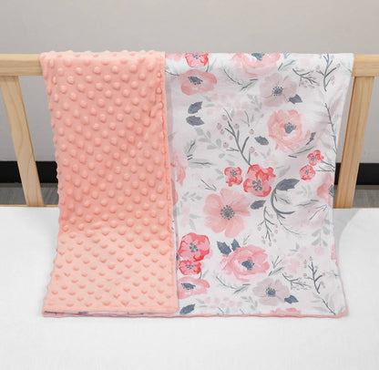 double sided pink minky blanket over wood crib ,pink and flowers