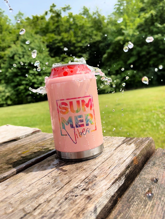 summer standard size can cooler outside on table with water splashing 