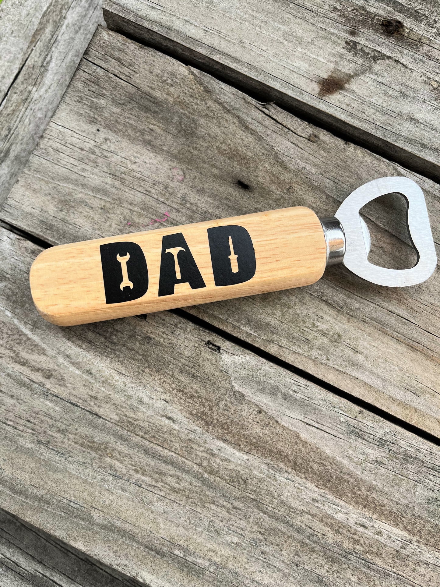 wood handle bottle opener for dad on wood background