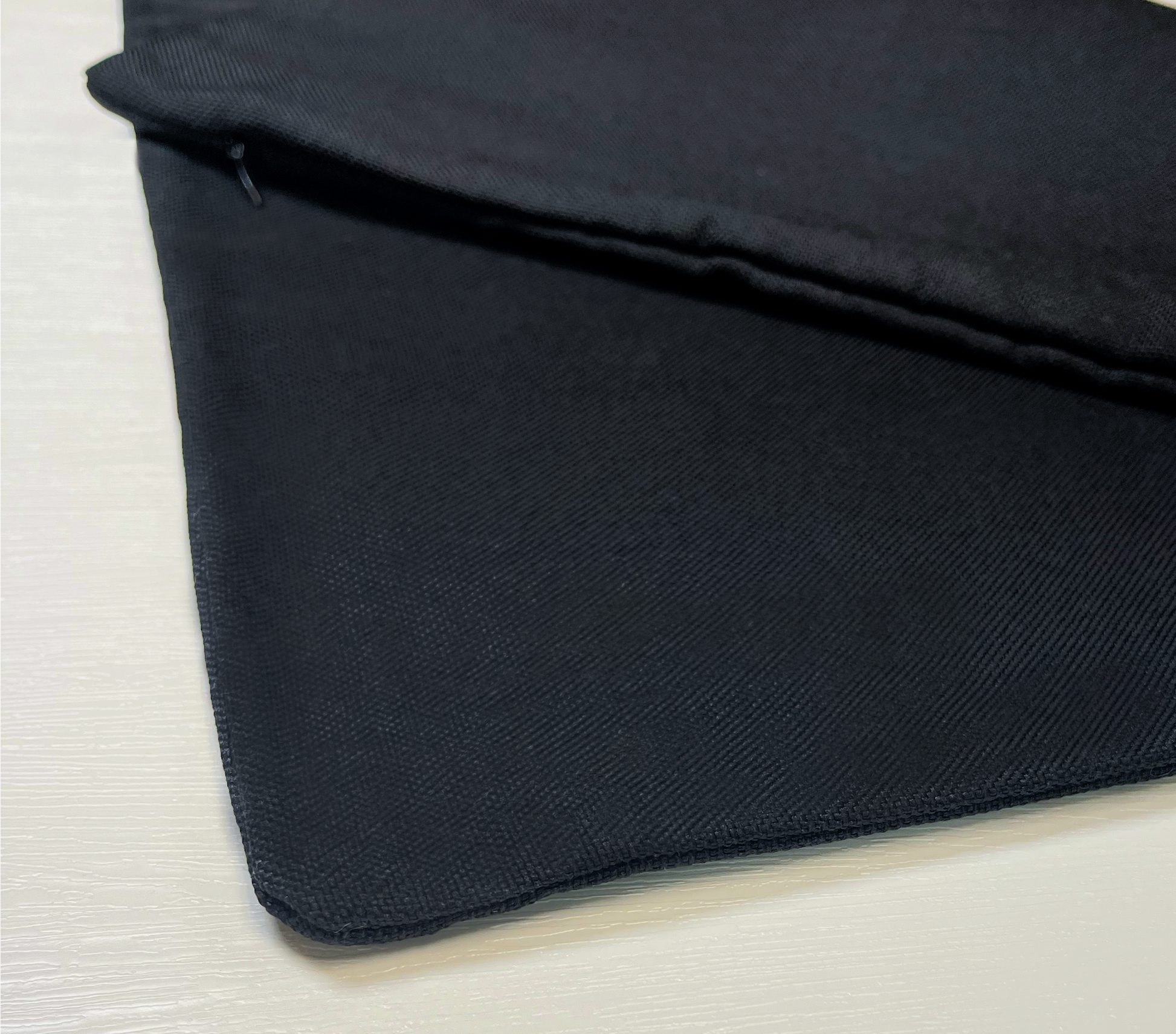 black jute pillow case cover with matching colour zipper on white background