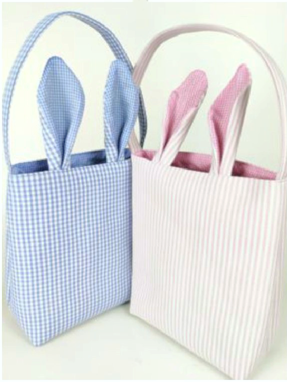 blue checkered and pink striped easter bag with ears and handle on white background