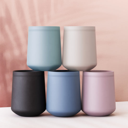 port acrylic wine tumblers stacked in two rows cloud blue white onyx black blue slate mauve pink on white table 