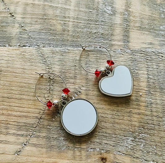 sublimation circle and heart wine glass charms with red beads on wood background