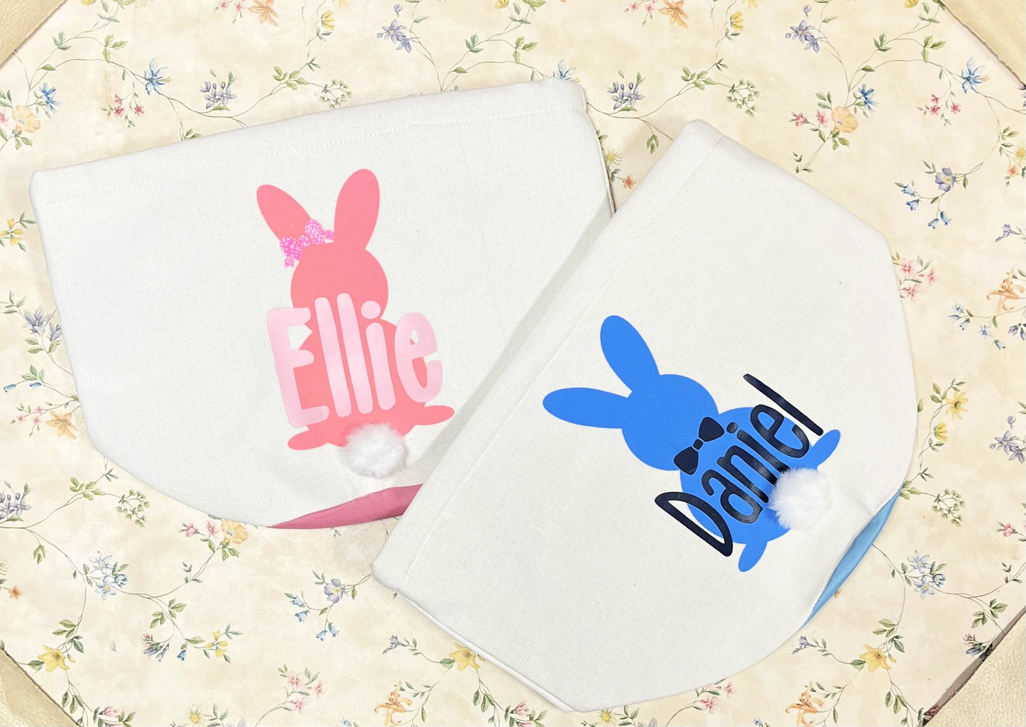 personalized pink and blue cotton tail Easter Basket on flower background