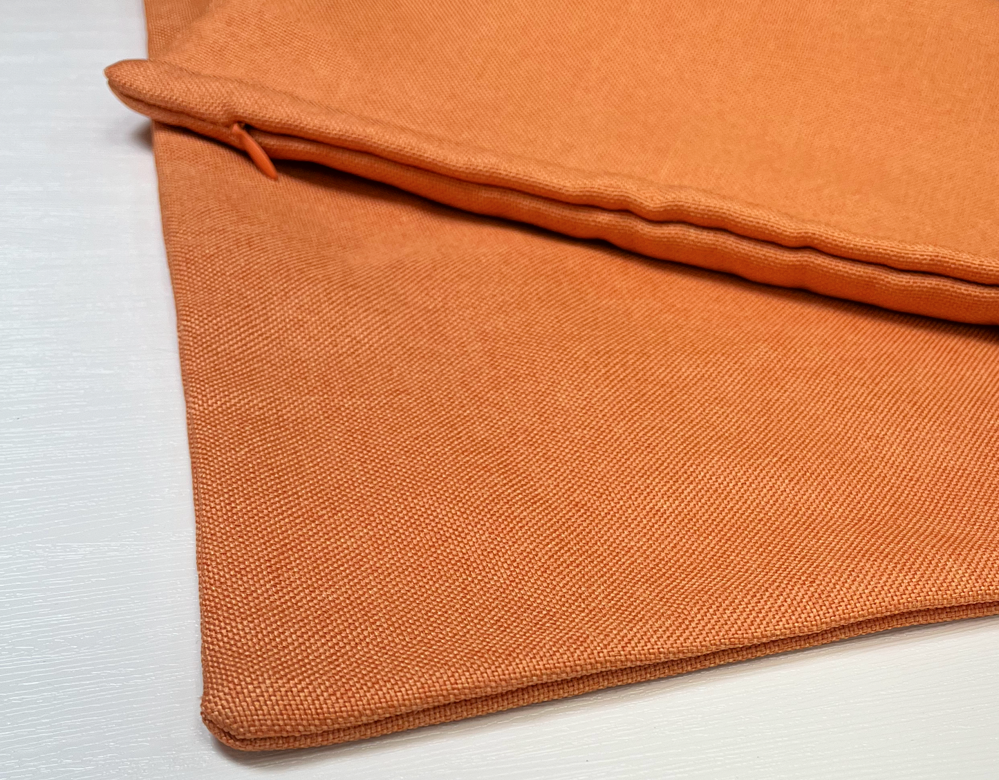 orange jute pillow case cover with matching colour zipper on white background